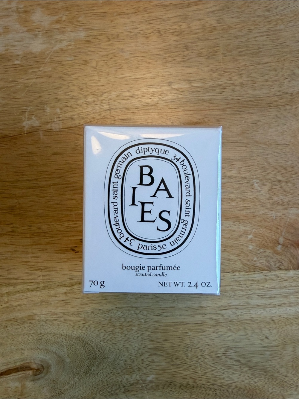diptyque Baies Candle in White and Black Packaging